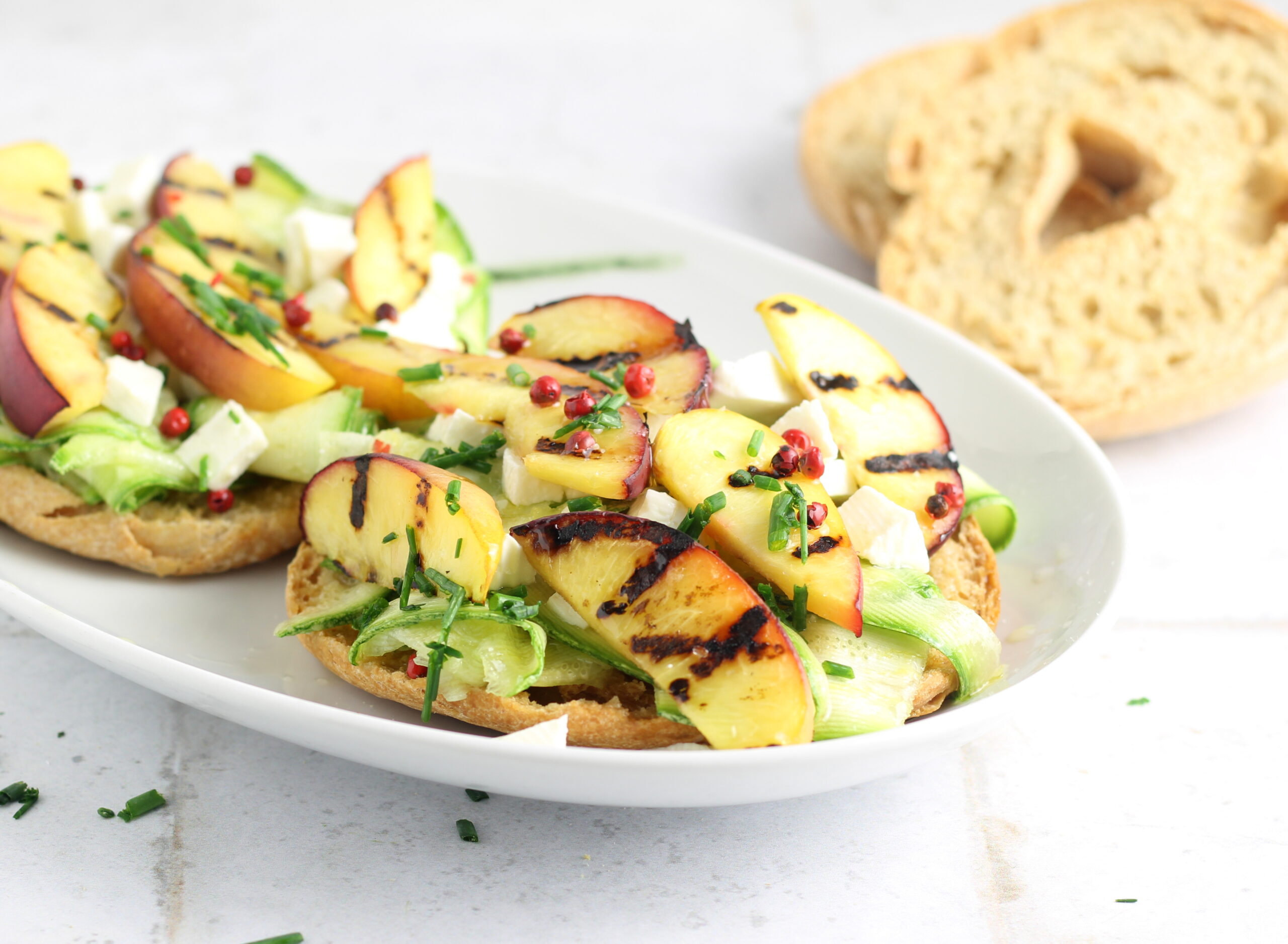 Friselle with Marinated Zucchini and Grilled Peaches