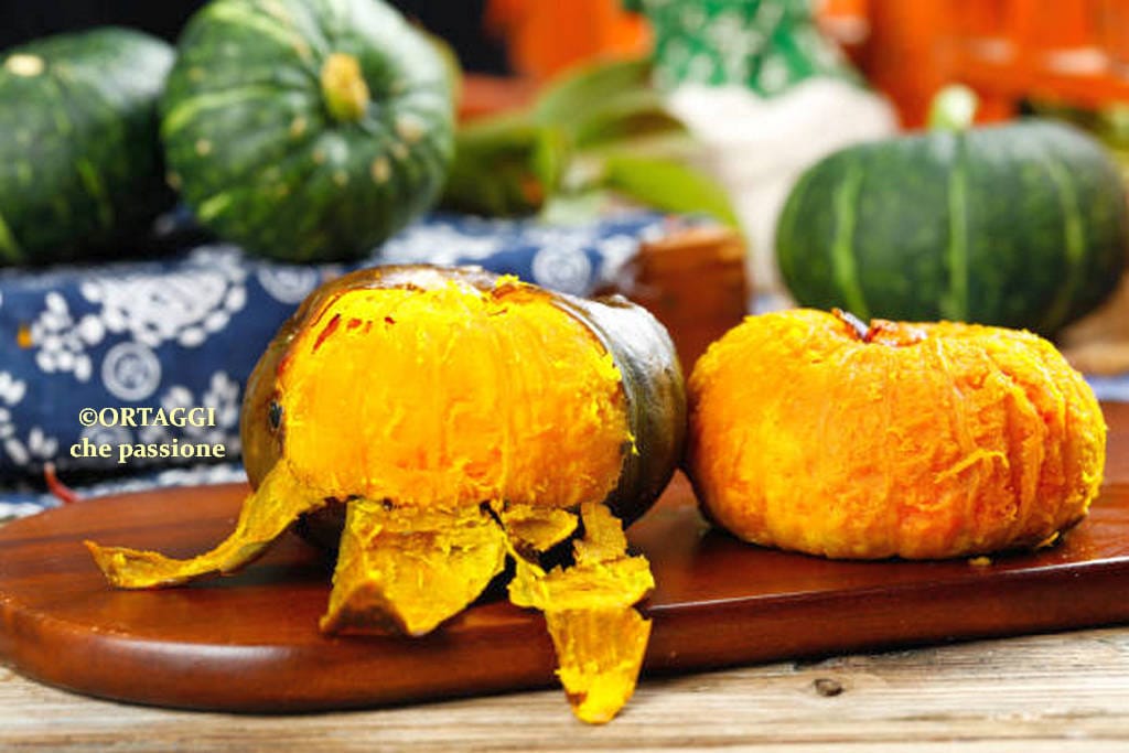 peeling whole oven-cooked pumpkin