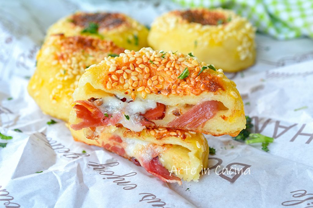 Potato focaccias with speck and provola cheese