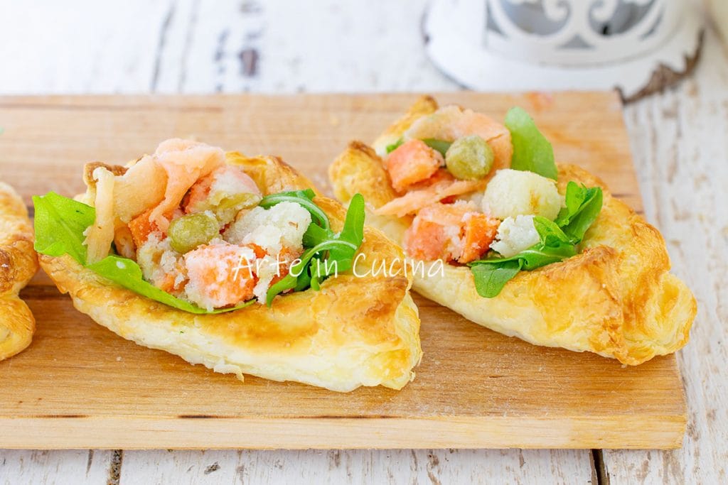 Puff pastry boats with Russian salad and salmon