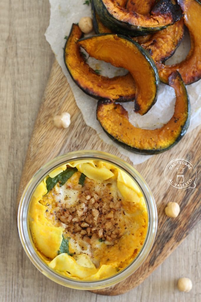 lasagna cooked in a jar in the microwave with taleggio, hazelnuts, and arugula in jar cooking