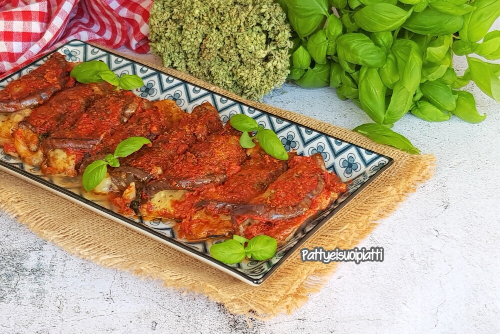 eggplant rolls with smoked cheese and speck