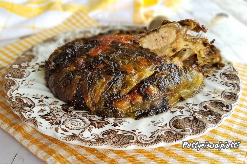 stuffed escarole cooked in a pan