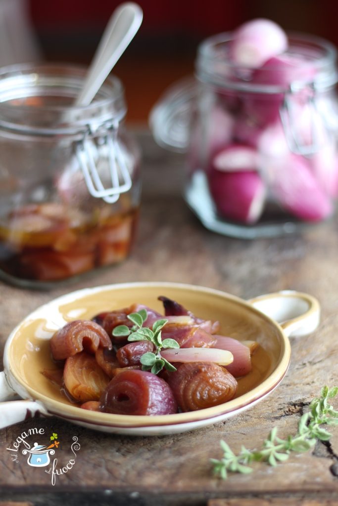 red onions cooked in a jar in the microwave with herbs