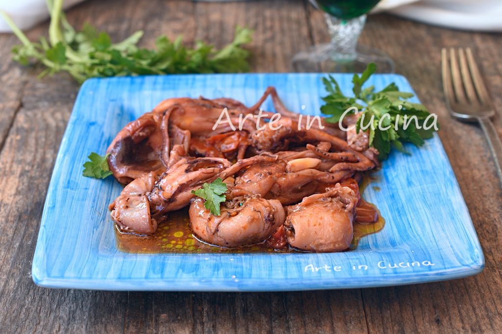 Sautéed baby octopuses in a pan