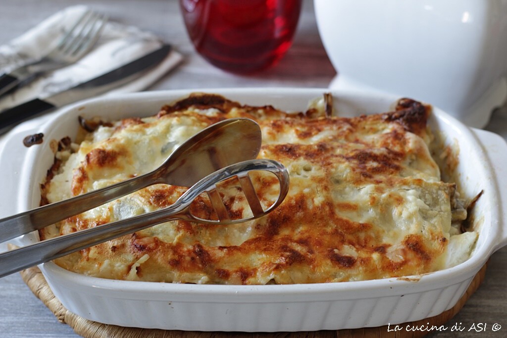 the pan of lasagna with artichokes and cheeses