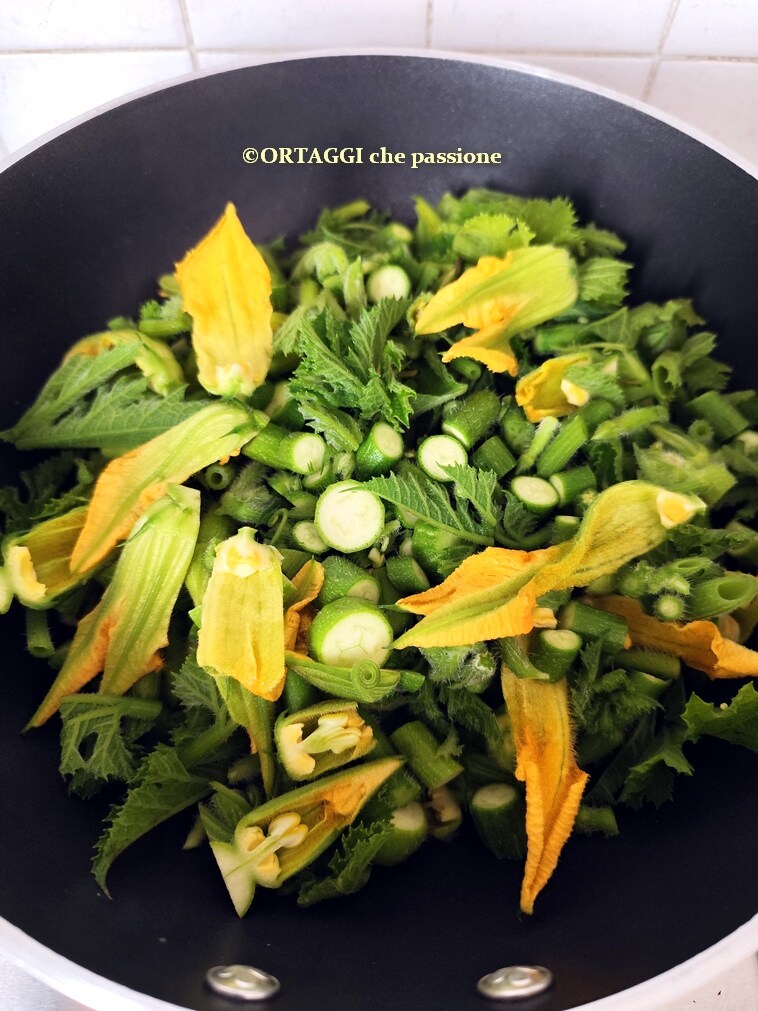 zucchini tips in a pan before cooking