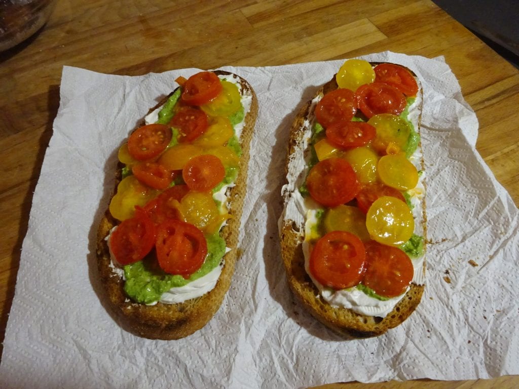 Vegan spread and cherry tomato bruschettas