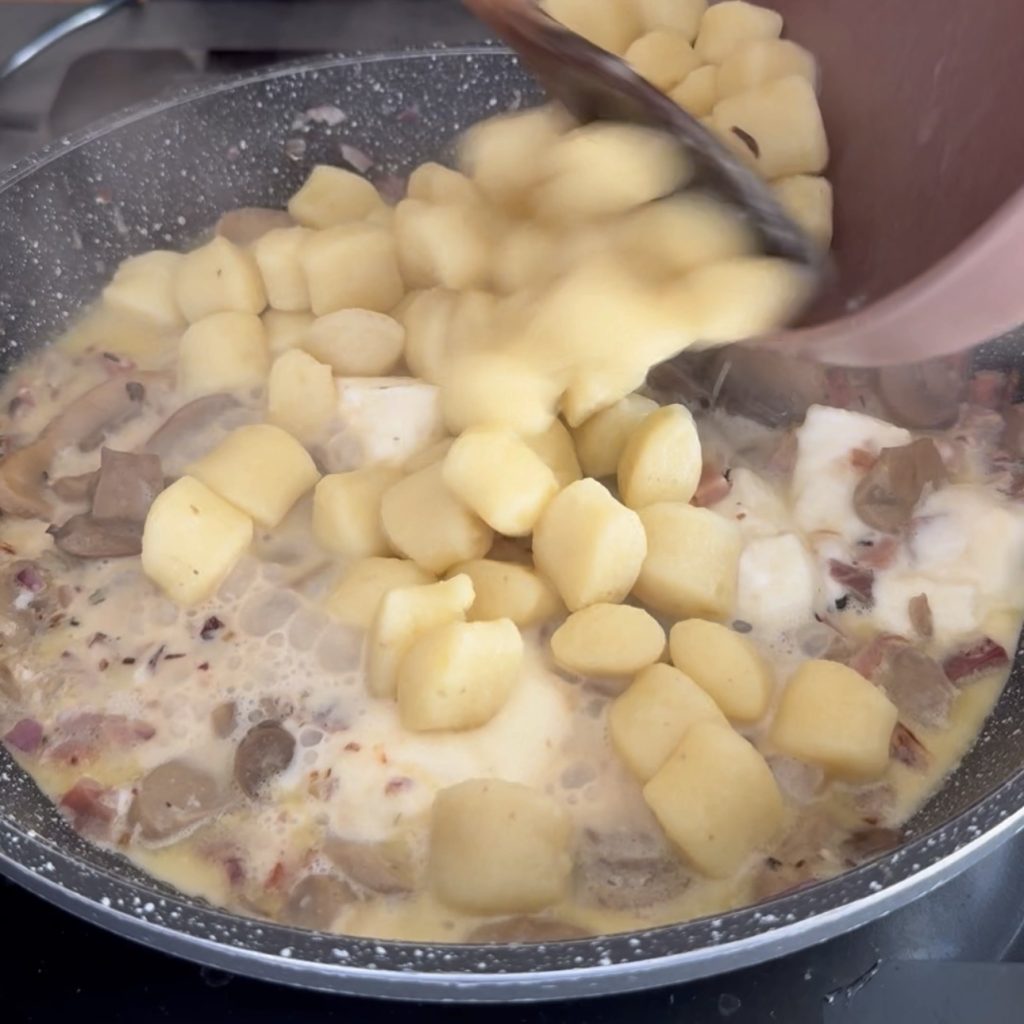 Gnocchi with stracchino mushrooms and speck