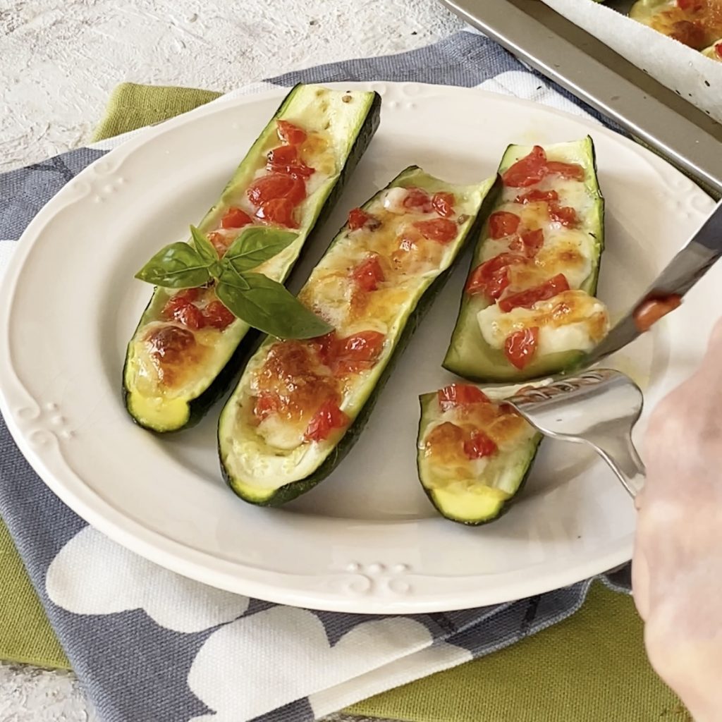 Zucchini with tomatoes and cheese