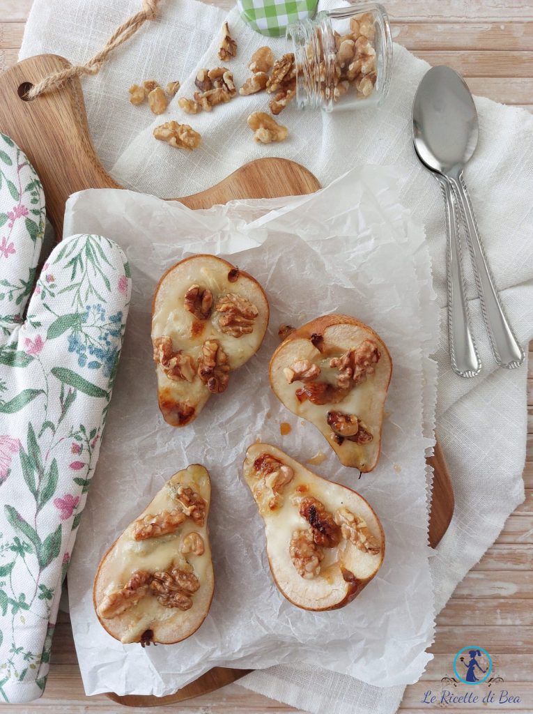 appetizer with baked pears, gorgonzola, honey, and walnuts