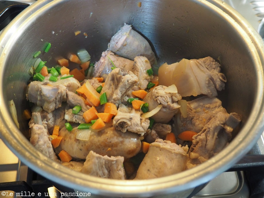 Cassoeula preparation in the pot