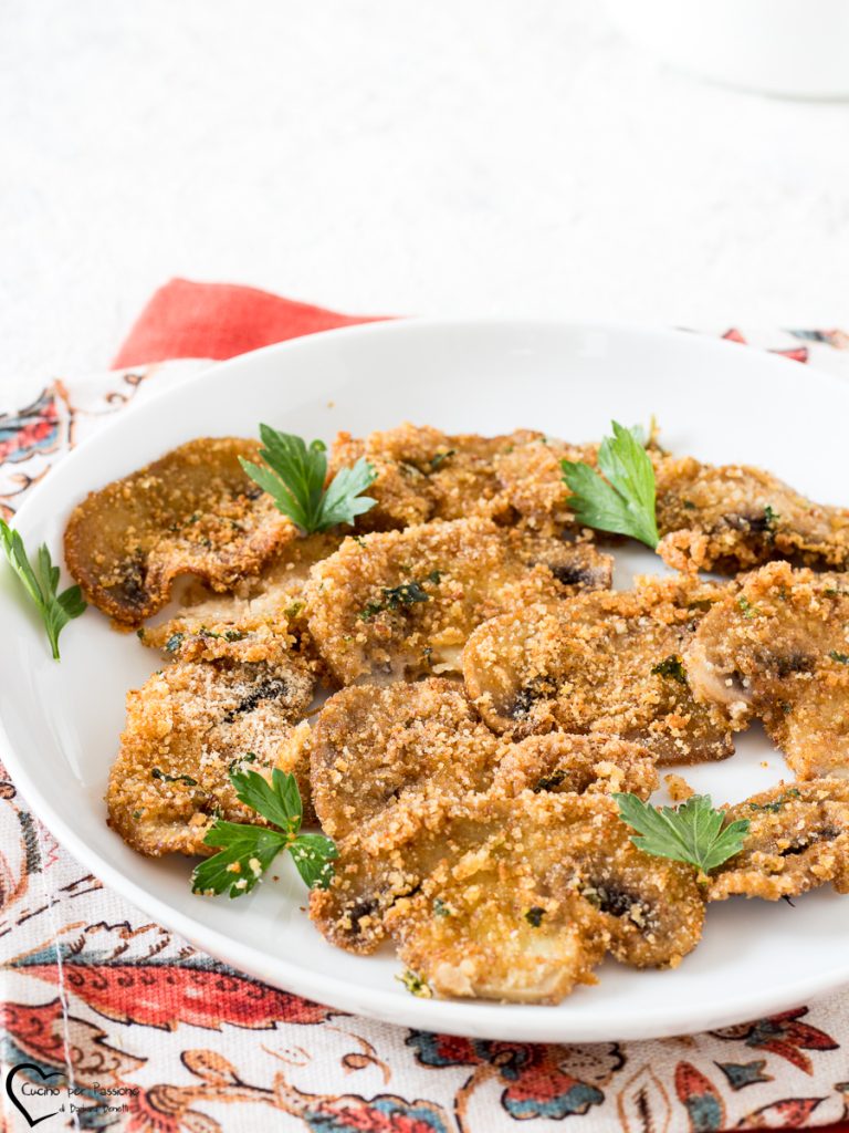 oven-baked gratinated champignon mushrooms