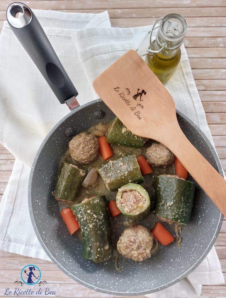 stuffed zucchini in a pan