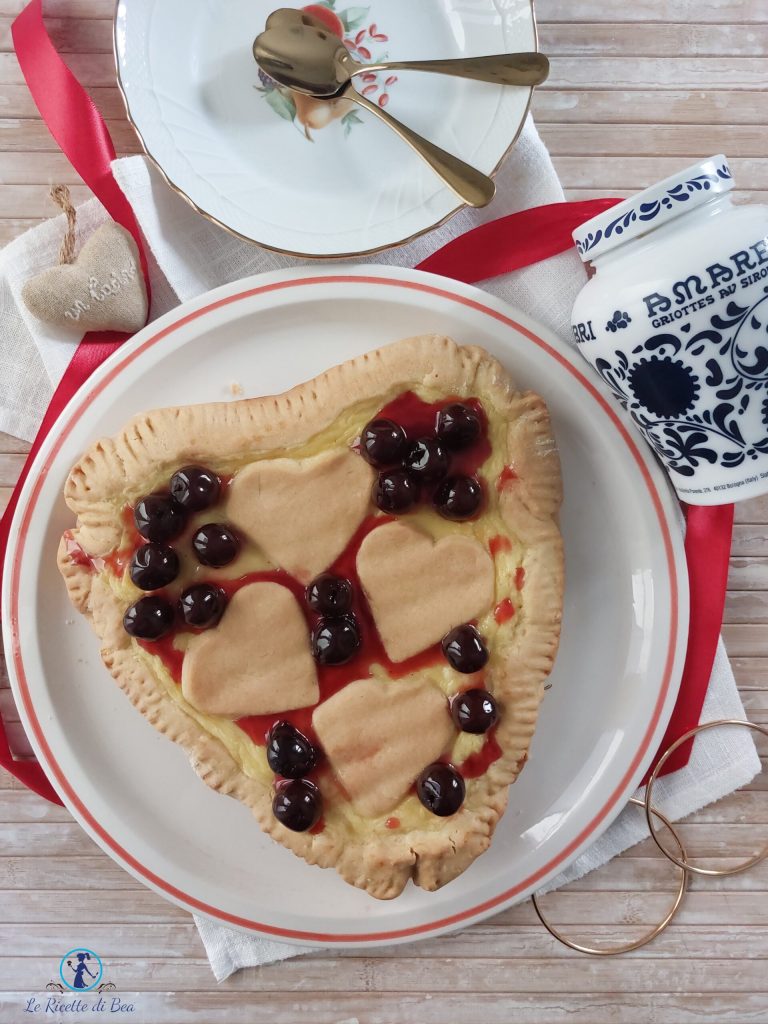 tart with seed oil, custard and sour cherries