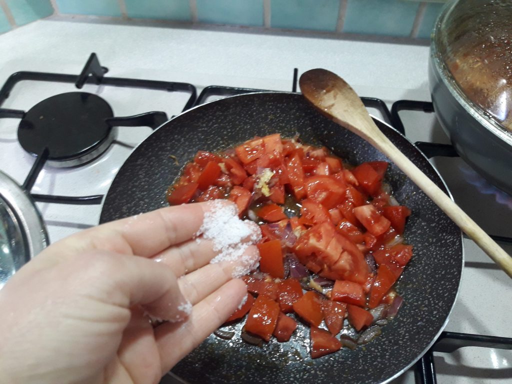 Caserecce with three tomatoes and basil