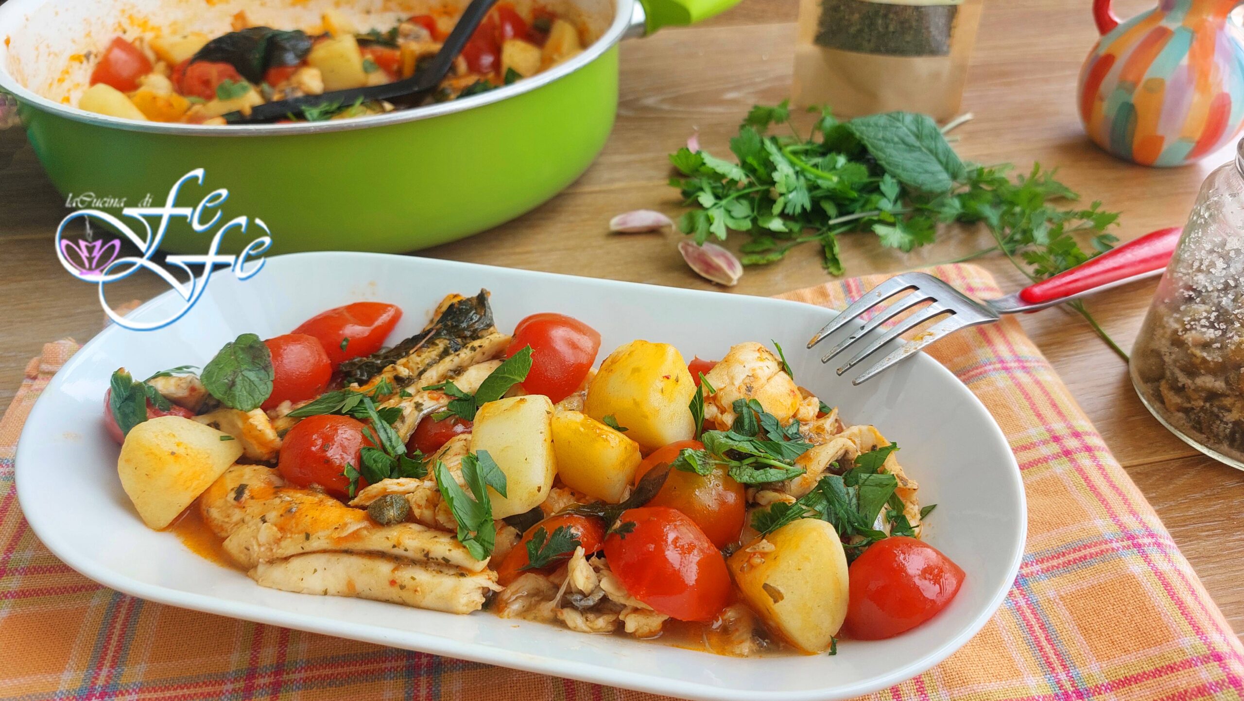 SILVER SCABBARDFISH IN PAN WITH CHERRY TOMATOES AND HERBS