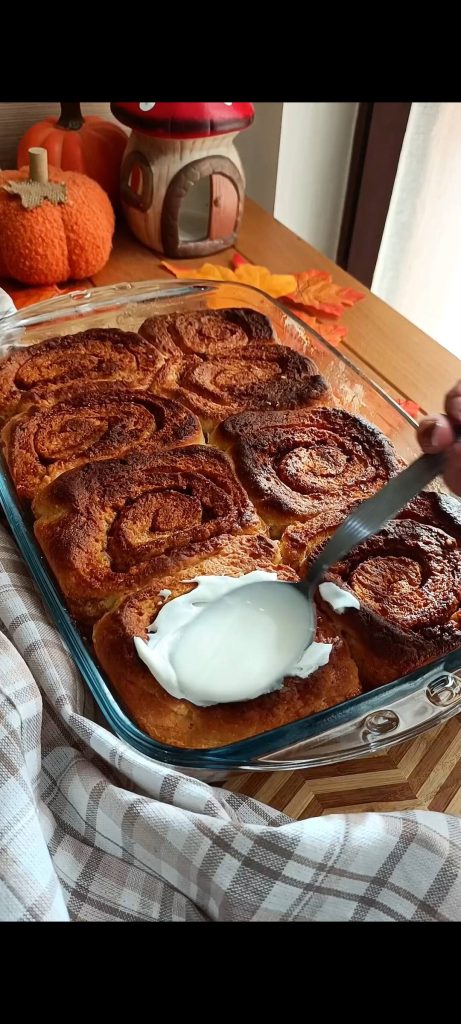 Spreading the cheese frosting