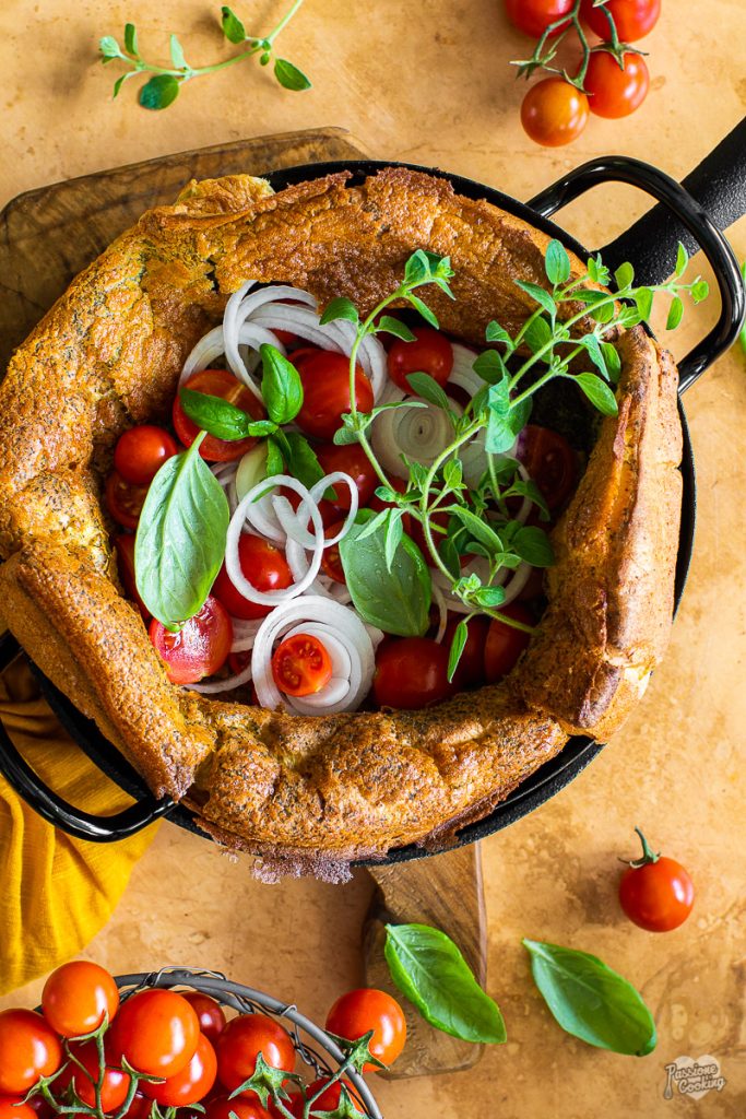 Dutch baby with cherry tomatoes and oregano