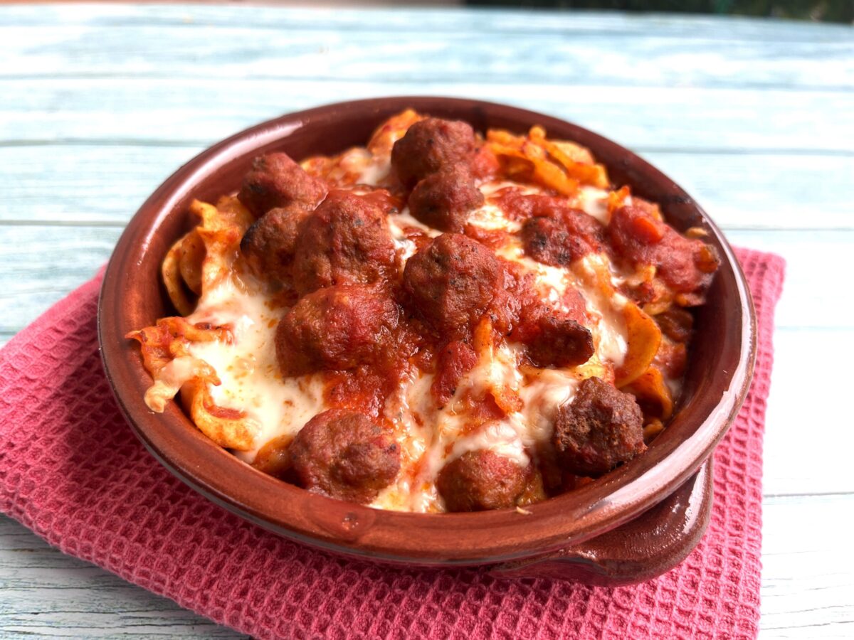 Orecchiette with Baked Meatballs in Terracotta Dishes.
