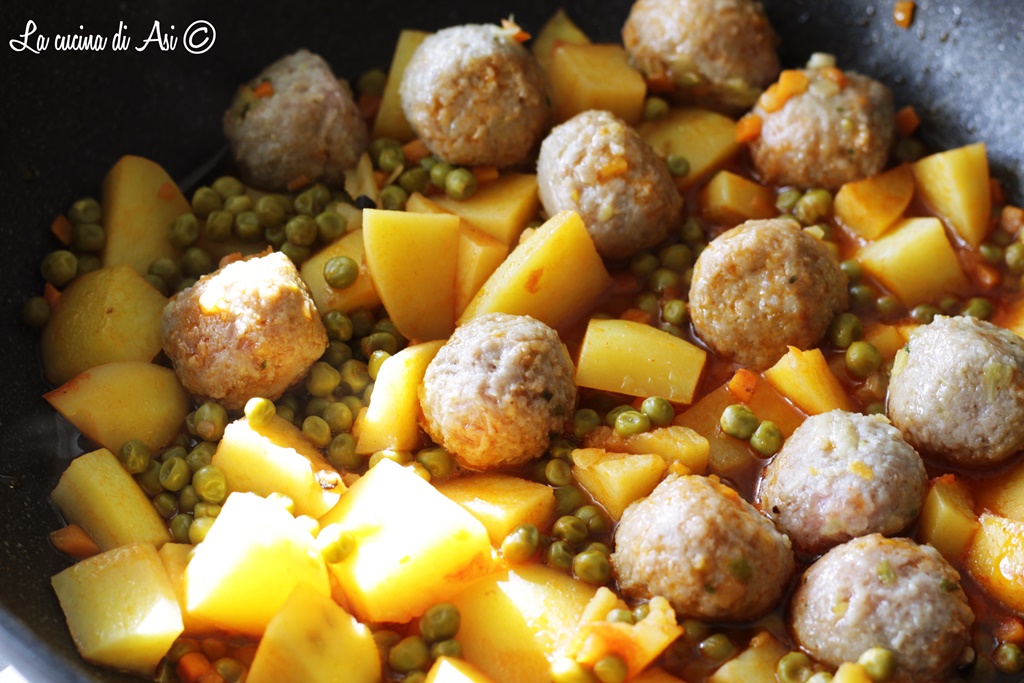 Meatballs with Potatoes and Peas in a Pan
