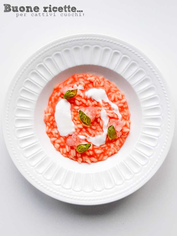 shrimp risotto with basil leaves