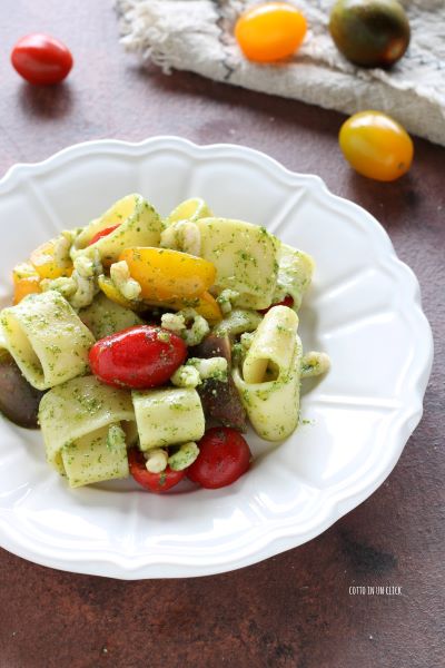 add the arugula pesto, mix and serve