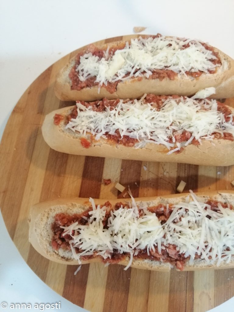 Baguette stuffed with meat and mozzarella