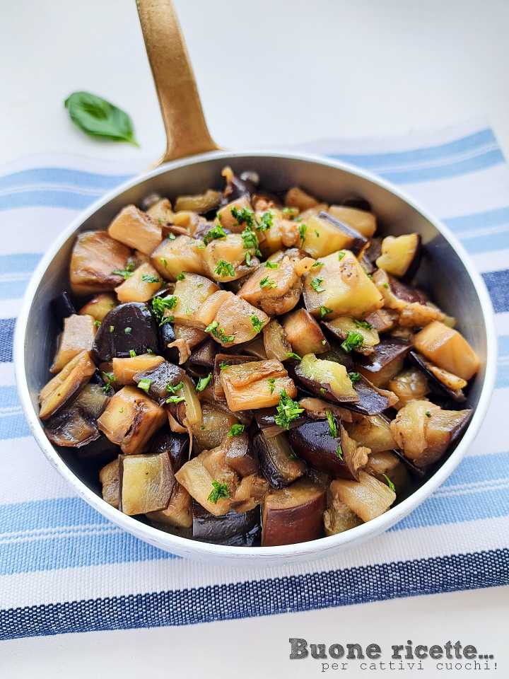 diced eggplants sautéed in pan
