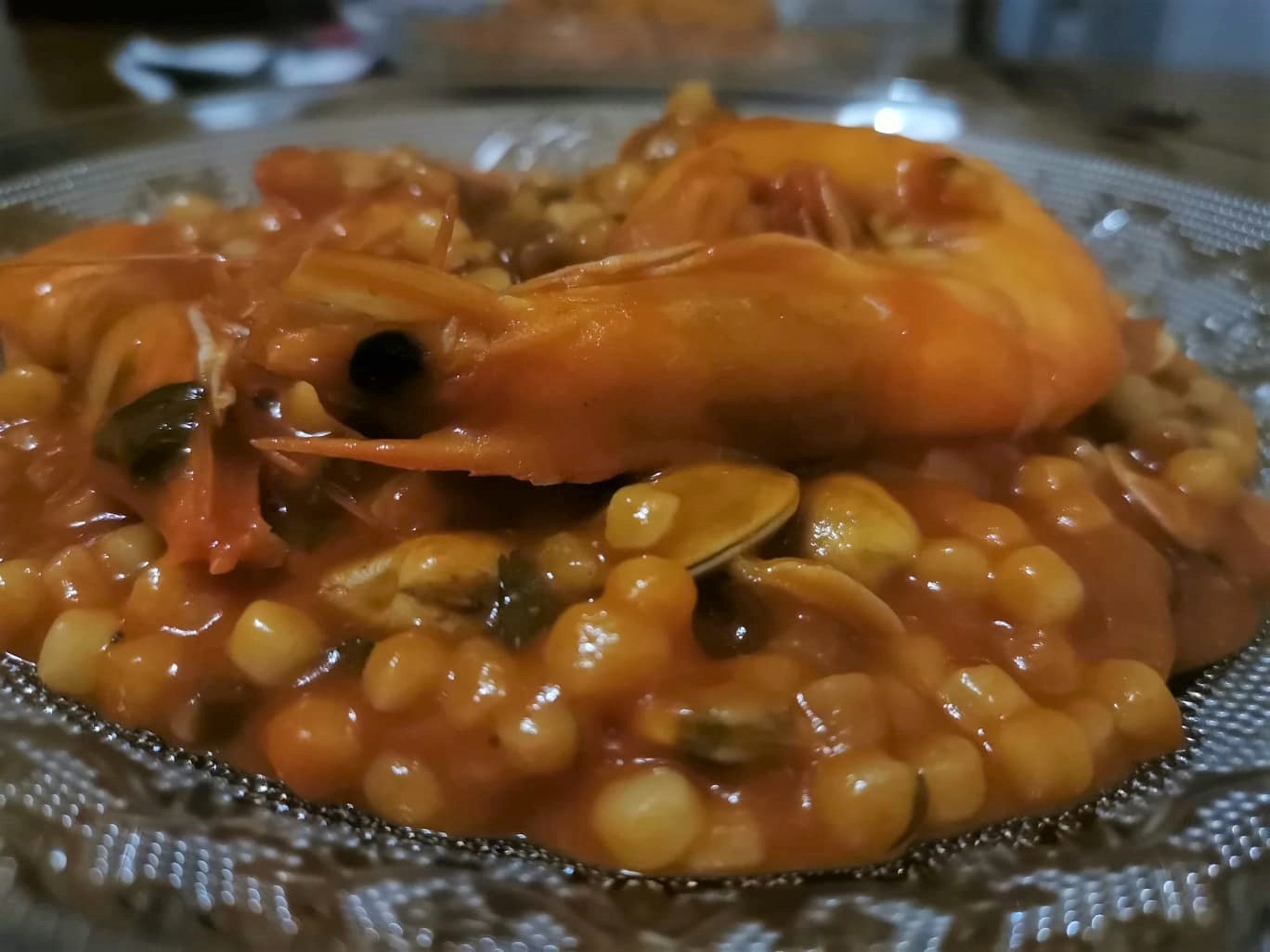 FREGOLA WITH BABY CLAMS AND KING PRAWNS