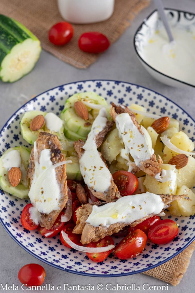 light potato and mackerel salad with cucumbers and cherry tomatoes