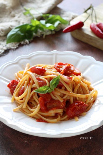 mix the pasta off the heat with grated cheese and serve with more fresh basil