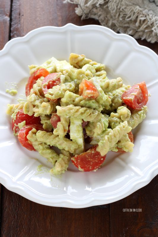 pasta with avocado cream and cherry tomatoes
