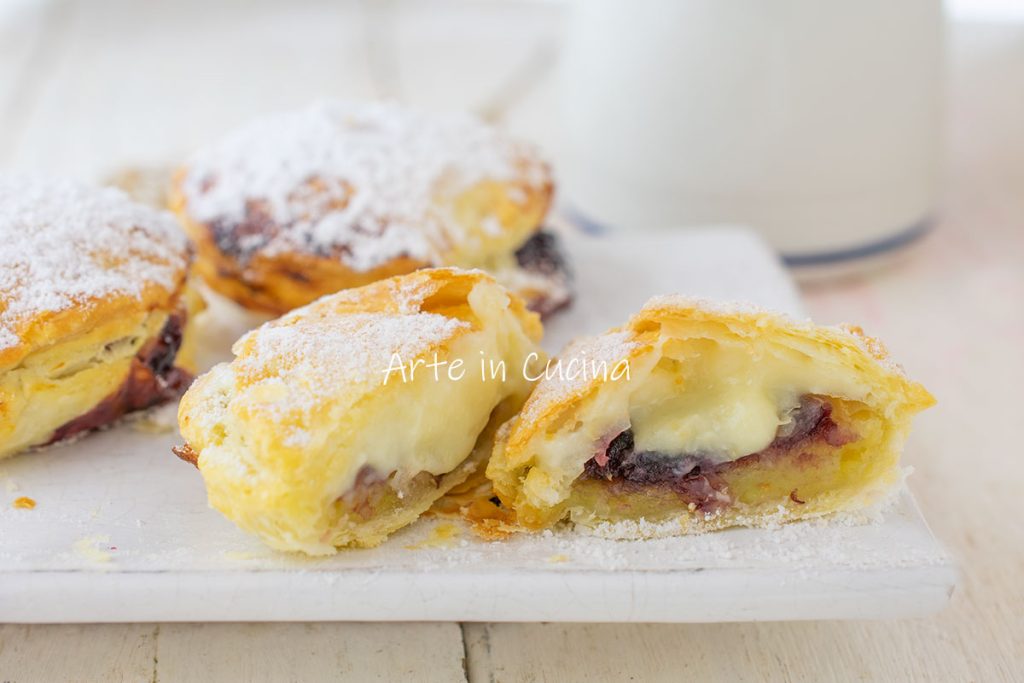 Puff pastry shells with cream and jam
