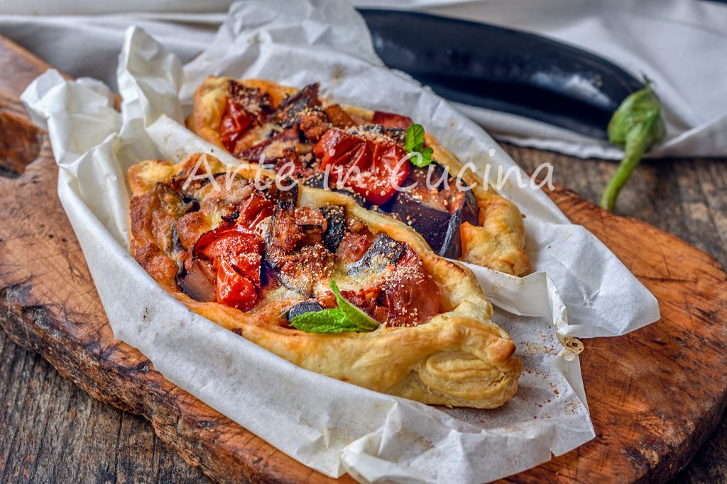 Quick puff pastry candies with eggplant and speck appetizer
