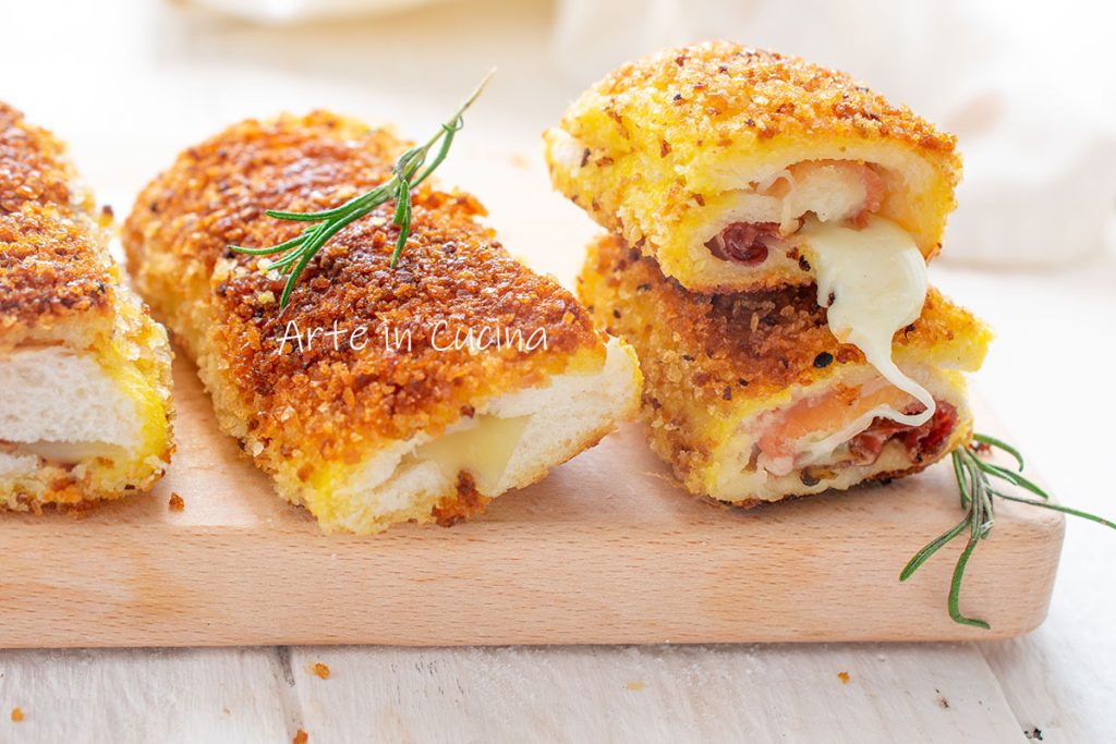 Sandwich bread cannoli with speck and provola