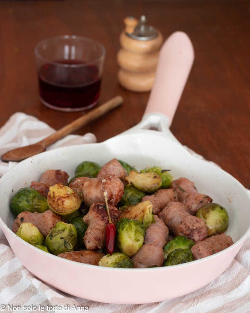sausages with Brussels sprouts in a pan