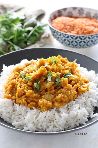 serve the red lentil dahl with boiled rice and chopped cilantro