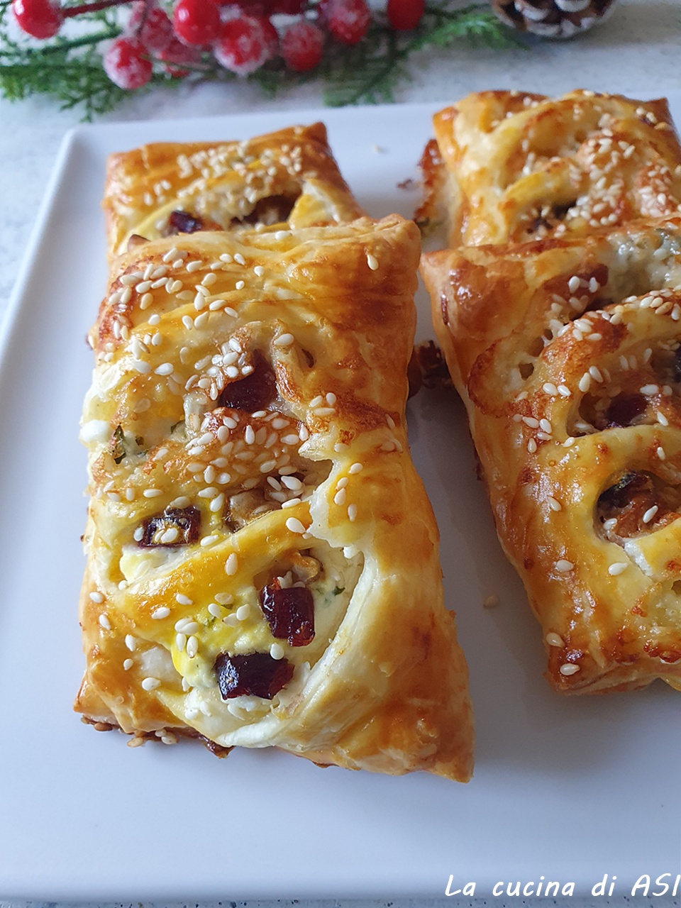 Skewed Filled Pastries with Cheese and Cranberries
