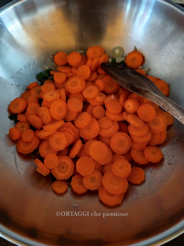 add the carrots to the pan