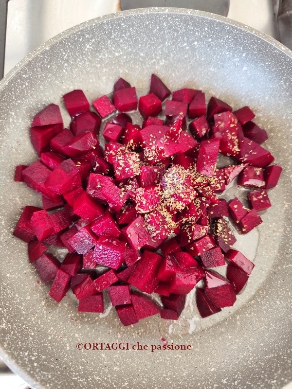 salting red beets in skillet