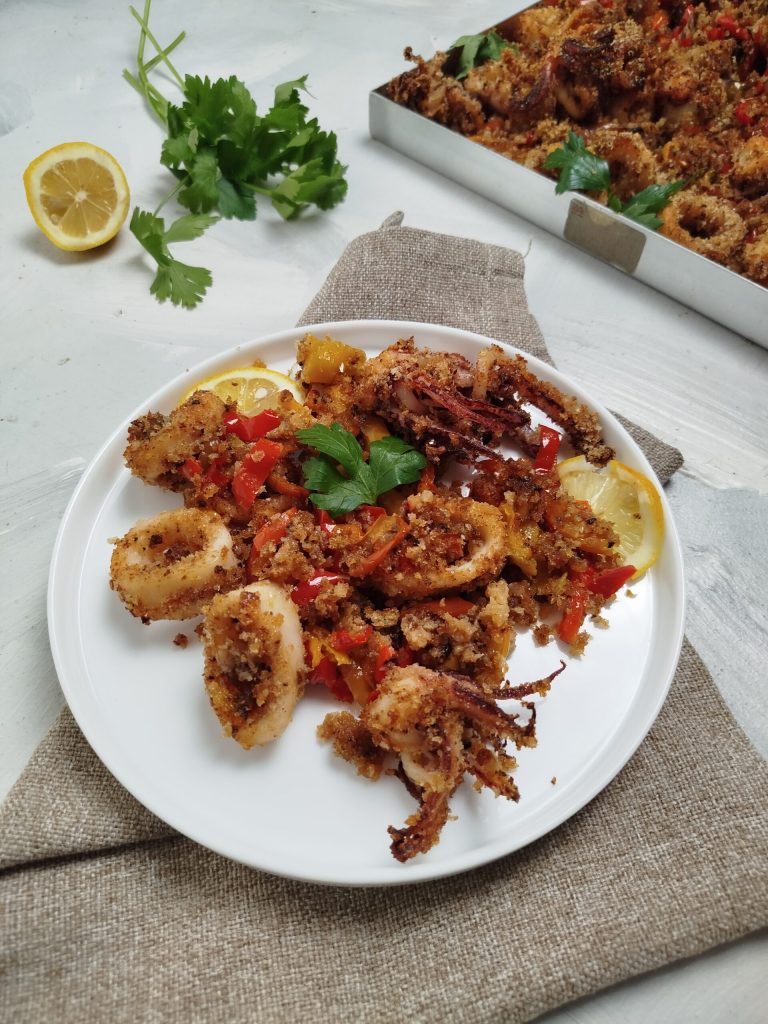 Baked calamari and peppers au gratin