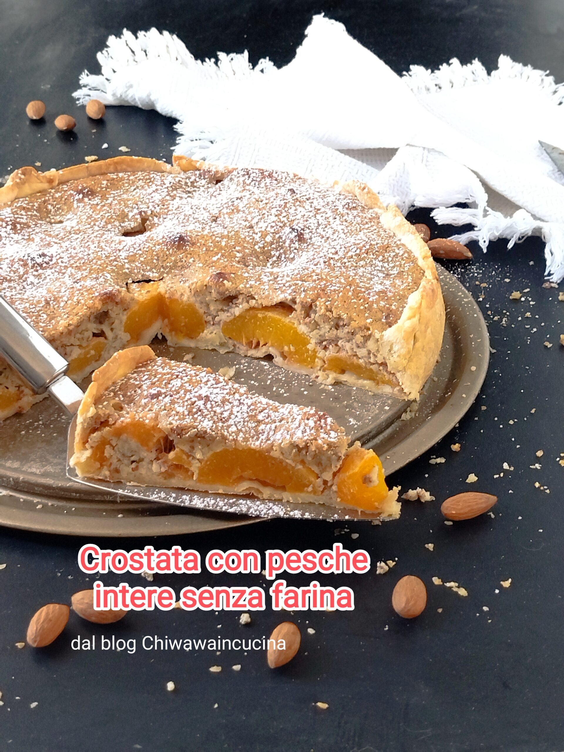 Tart with Peach Halves and Almonds