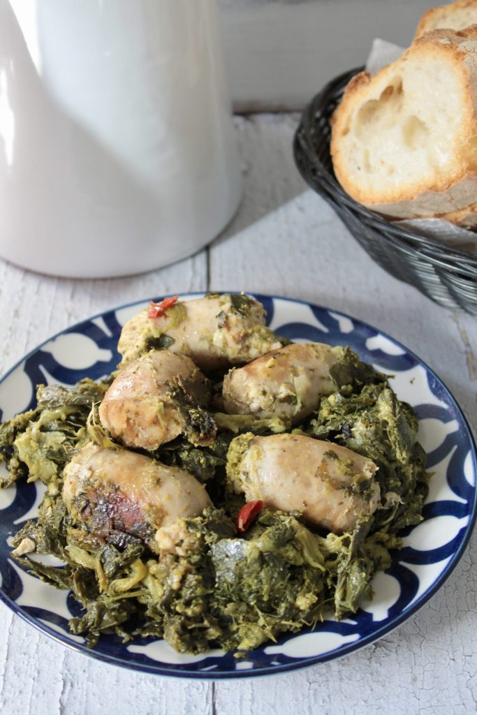 Vertical plate of broccoli with Roman-style sausage, rustic recipe ideal as a single dish