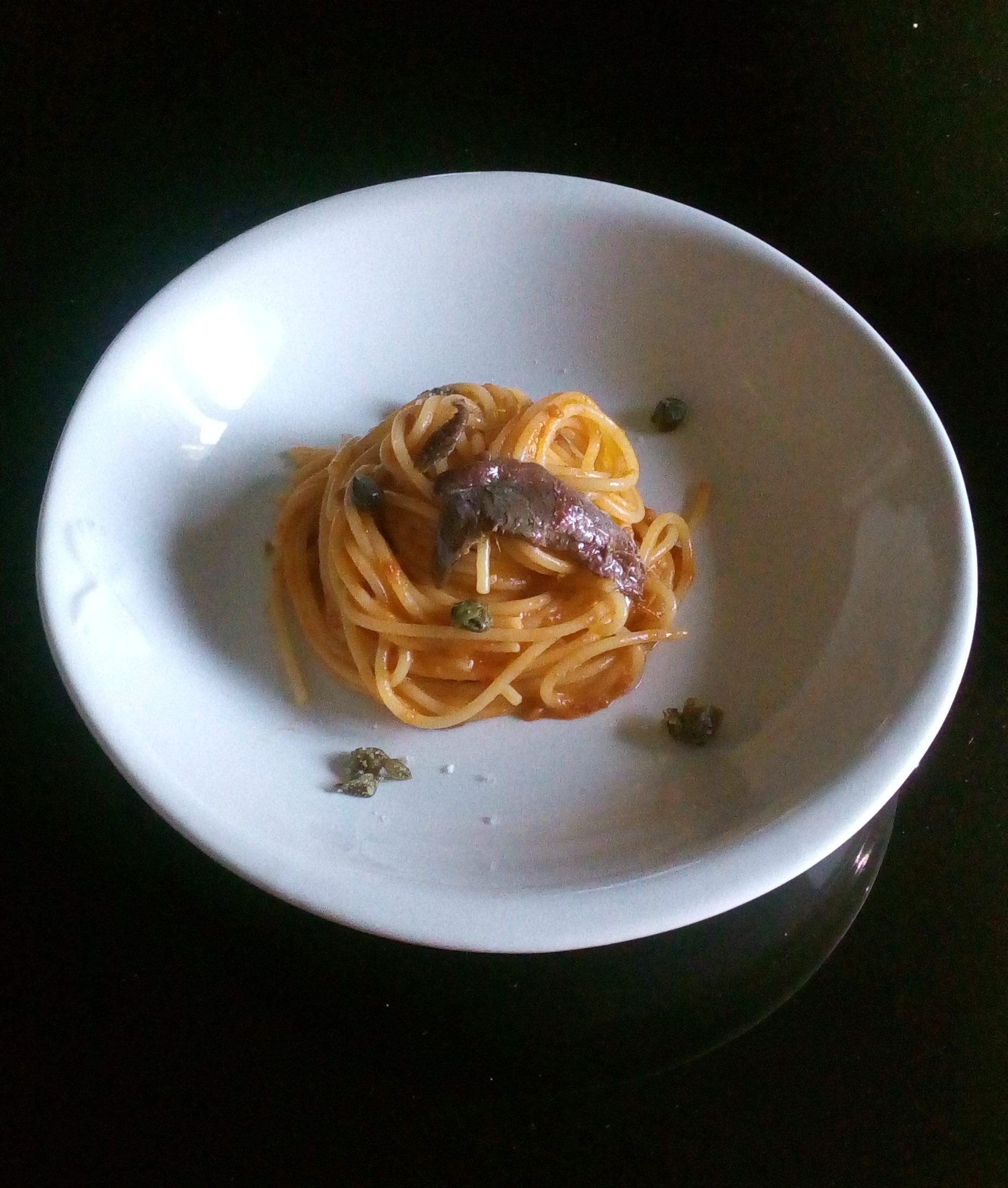 Spaghetti with Anchovies, Tomato, and Tropea Onions