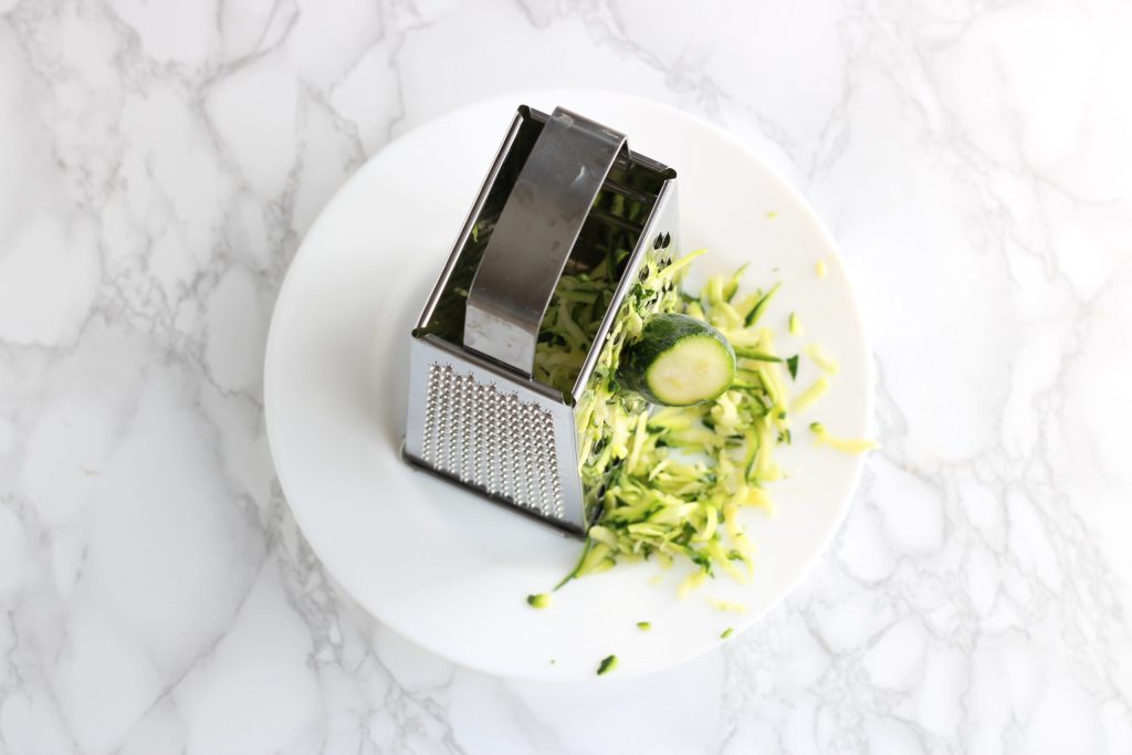 slicing zucchini for pesto
