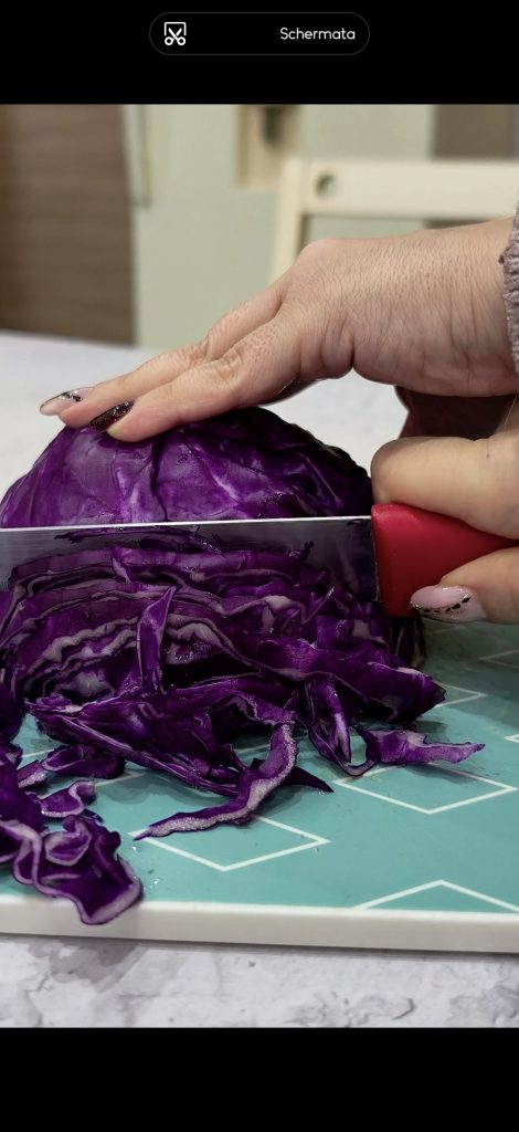 Slice the red cabbage into thin strips