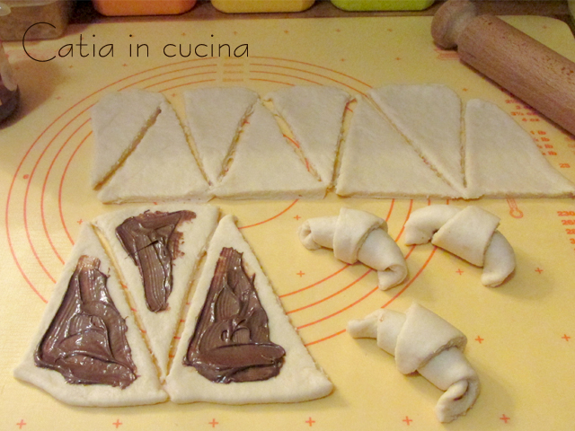 filled croissants making