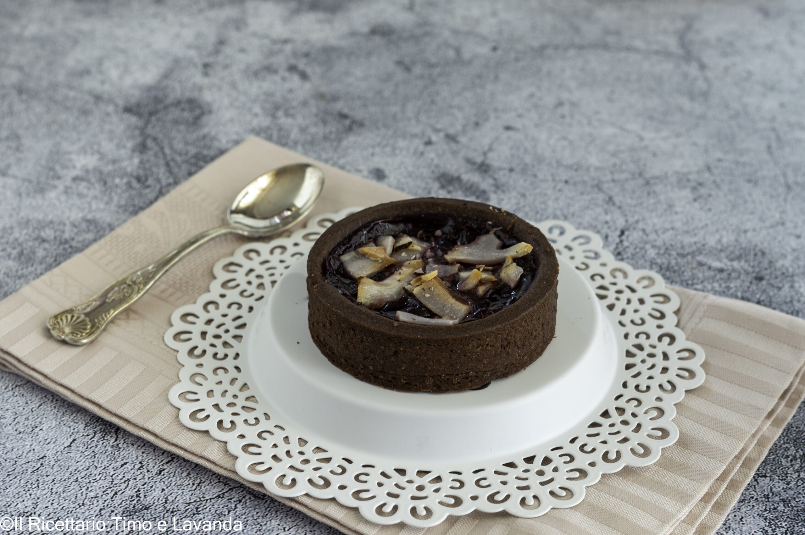 Mini Tarts with Raspberry Jam and Cocoa Rice Shortcrust