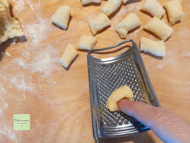 pass each gnocco on the back of the grater